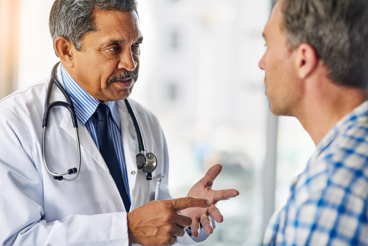 Cropped shot of a doctor a giving his patient advice during a consult